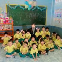 Happy New Year photo of kids and teacher