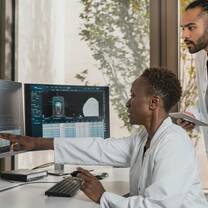 Doctors looking at MRI