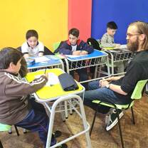 Teacher with students in classroom