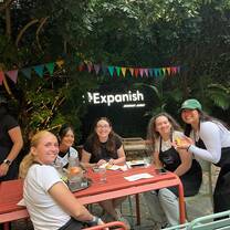 Students relaxing on the school patio, Expanish Latin America