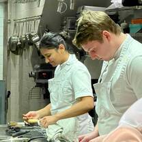 Young culinary interns working in a kitchen