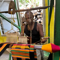 kumasi centre man making traditional fabric