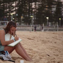 Student Studying on the Beach in Noosa Australia