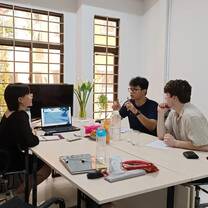 students sitting around a table
