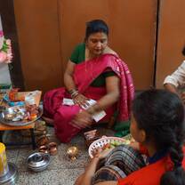 My host family doing puja