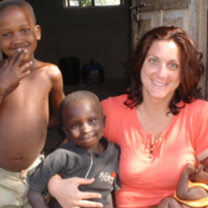 Village Volunteers with children in Kenya