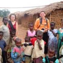 Volunteers with local children in Uganda