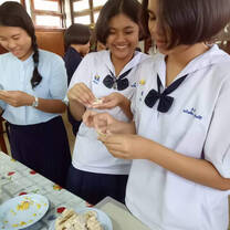International students studying Chinese and making dumplings in China