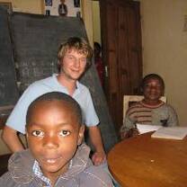 A volunteer with students in Cameroon