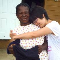 A volunteer with a local in Belize