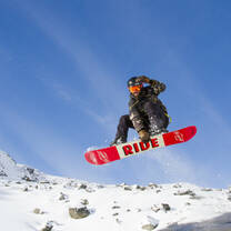 snowboarder catching air