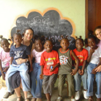 Village Volunteers with children in Ghana