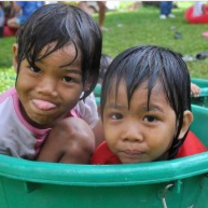 Thai children in bucket