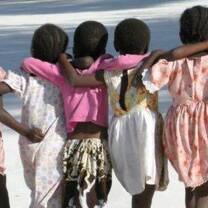 Children on the beach in Tanzania