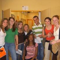 Semester study abroad participants in Spain attending an outdoor learning experience in a city plaza.
