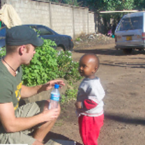 A volunteer working with children in Tanzania