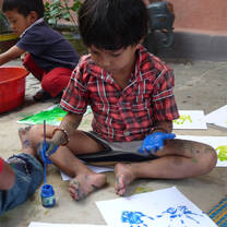 Run creative workshops on arts and crafts, sports, writing in Nepal