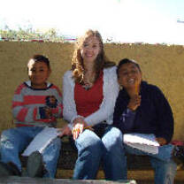 Volunteer Cara with Fernando and Manuel