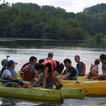 Volunteers kayak in France with Volunteers For Peace