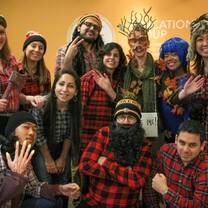 Staff of the ILSC-Montréal team posing for the camera in costume.