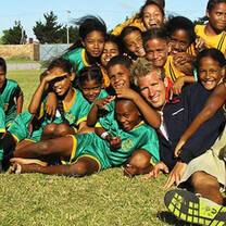 group of children and volunteers in South Africa
