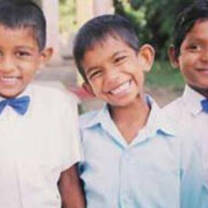 Children from Sri Lanka in blue bowties