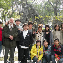 Photo of current teacher in China with students