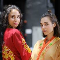 au pairs wearing traditional Chinese clothes