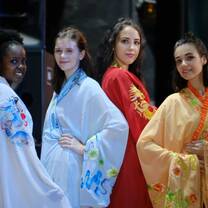 au pairs wearing traditional Chinese clothes at Chinese culture trip