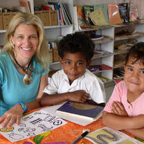 Volunteer with students in the Cook Islands