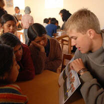 Volunteer with children in Bolivia