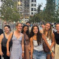 Students smiling as a group in Madrid