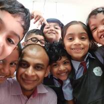 Proud TEFL Graduate with Students