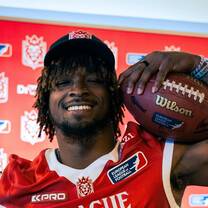 A man holding football