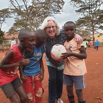 school kids with a volunteer
