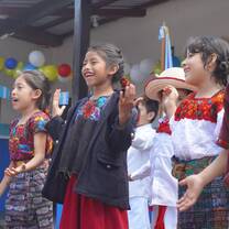 Students singing and dancing