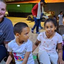 Volunteer with local children 