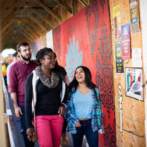 Students walking in a museum. 