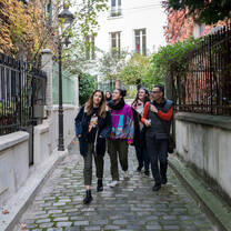 Students walking in a decorative alley. 