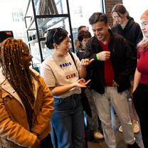 Group of students learning and smiling. 