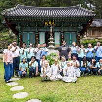 Group of students in front of temple in South Korea