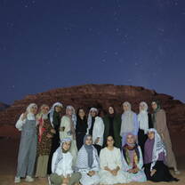 Group photo in the desert at night