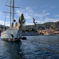 Students doing boat jumps in Nice, France