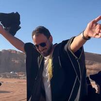 Man with arms wide open