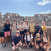 Students in front of the Colosseum in Rome