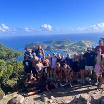 Students at the top of a peak in Les Saintes