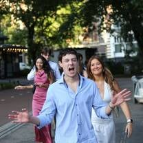 Students walking through Amsterdam on their way to the graduation photoshoot during their study abroad program.