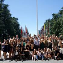 Students posing for a group picture at the World Federation of United Nations Associations during their study abroad program.