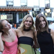 Students celebrating their study abroad graduation with a photoshoot.