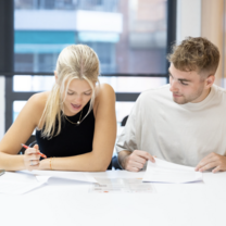 Two students studying in class